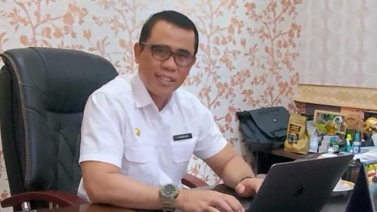 Yuliandris - Plt Kepala Dinsos Kukar