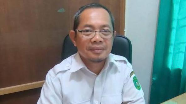 Riadi Hadiwinoto -  Kepala Bidang Penanganan Korban Bencana dan Pengelolaan TMP Dinsos Kukar