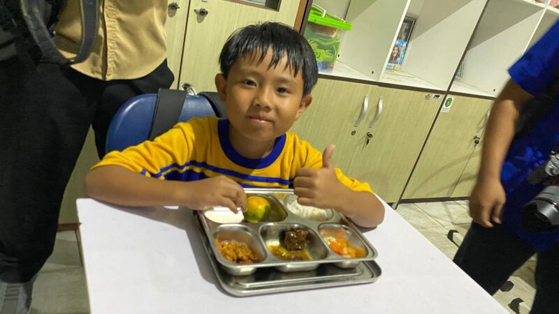 Teks Foto : Ilustrasi penyaluran MBG masa libur sekolah (Latif/Eksposisi)