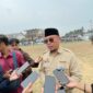 Kepala Dinas Pendidikan dan Kebudayaan Kutai Kartanegara Heriansyah saat diwawancara awak media (Latif/Eksposisi)